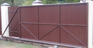 Купить откатные ворота из профнастила Батайск, цена от 1750 руб.
